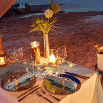 Alistate-Cena sobre la playa